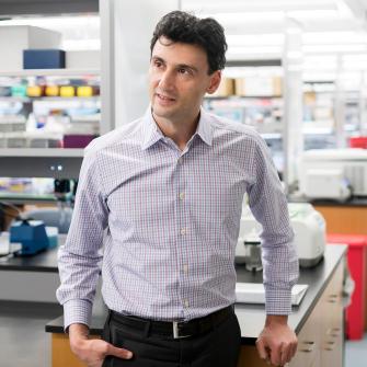 Scientist Stands in a Laboratory