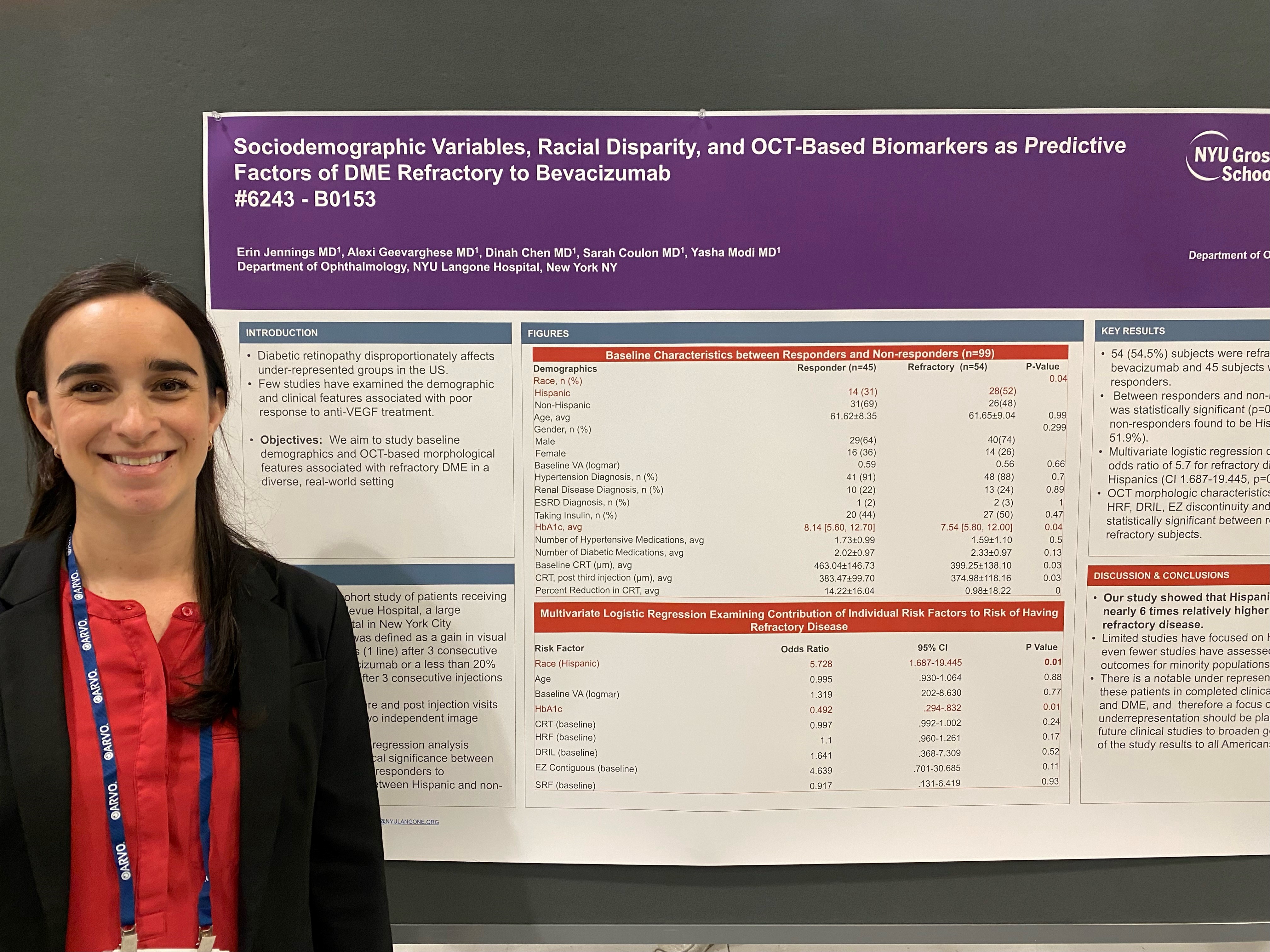 A physician stands in front of a presentation board detailing medical research