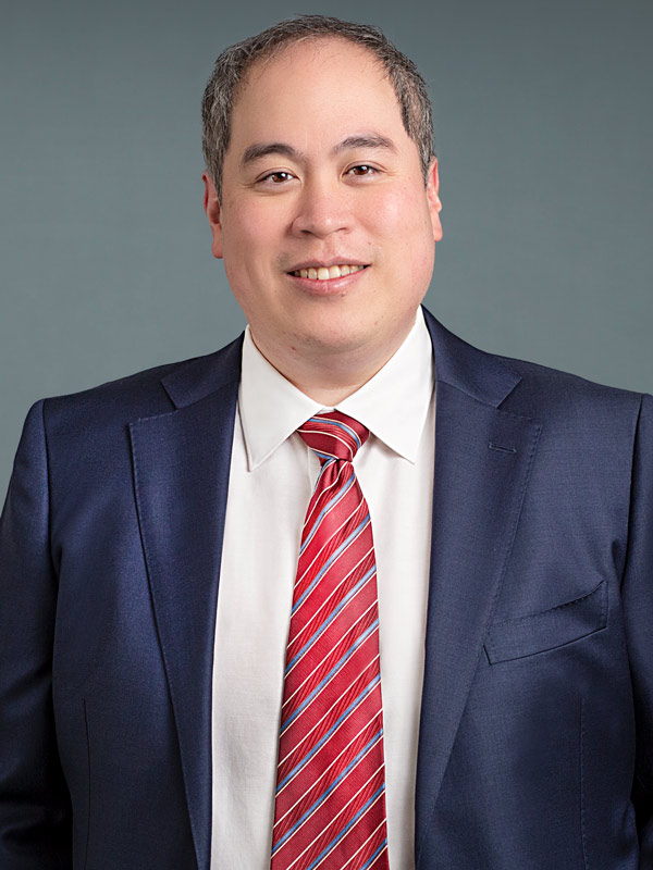 Faculty profile photo of Justin C. Chan