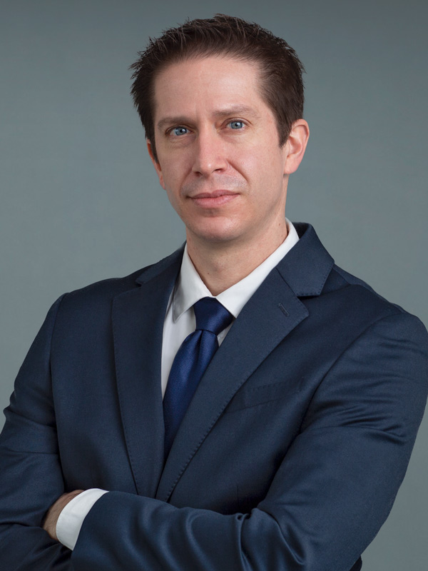 Faculty profile photo of Justin R. Henning