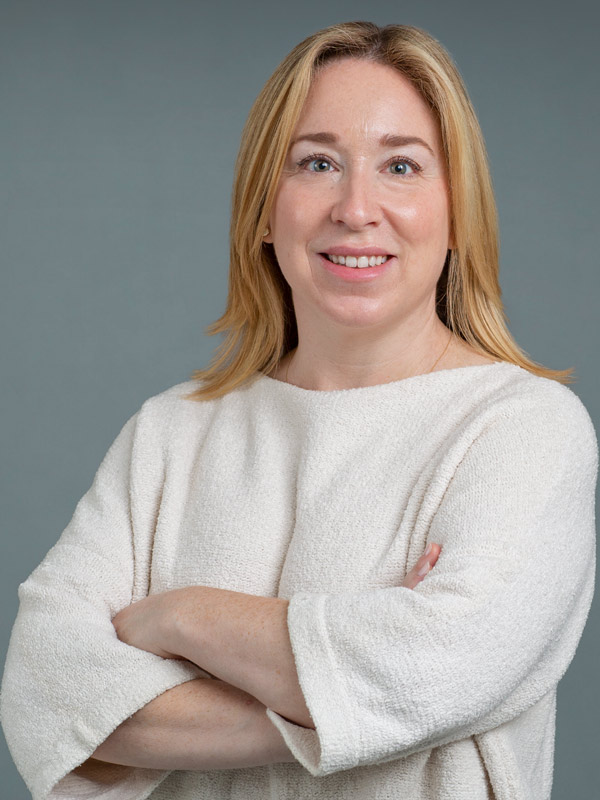 Faculty profile photo of Rebecca  Pellett Madan