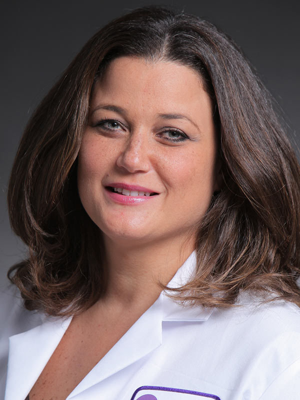 Faculty profile photo of Adelle T. Quintana