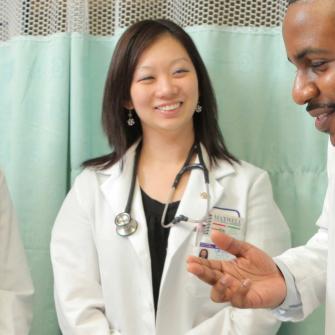 Attending Physician Dr. Robert Roswell and Students