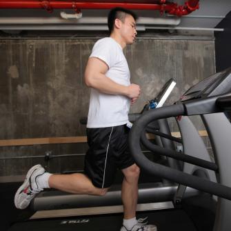 Man Running on Treadmill