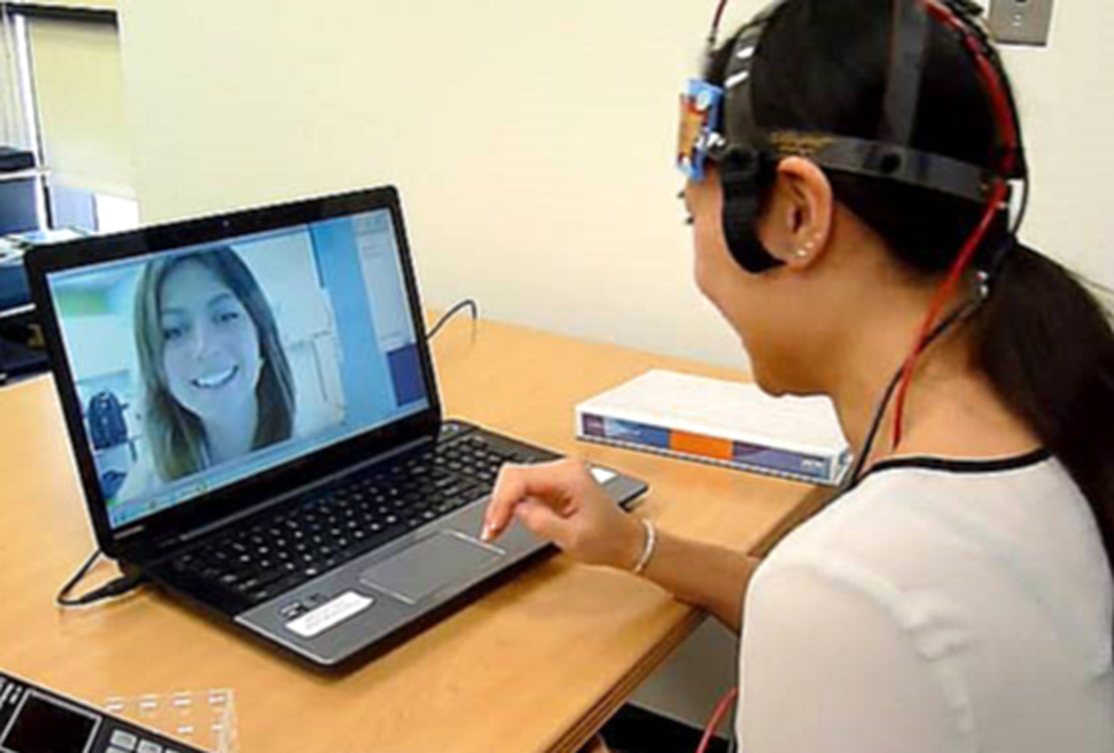 Patient completes home tDCS treatment in videoconference