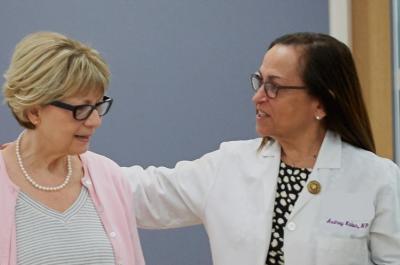 Doctor and Patient Walking Through Perlmutter Cancer Center