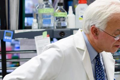 Dr. Martin Blaser and Colleague Speaking in Lab