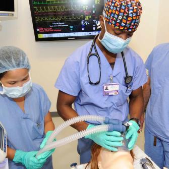 Surgeons and Anesthesiologist in Operating Room